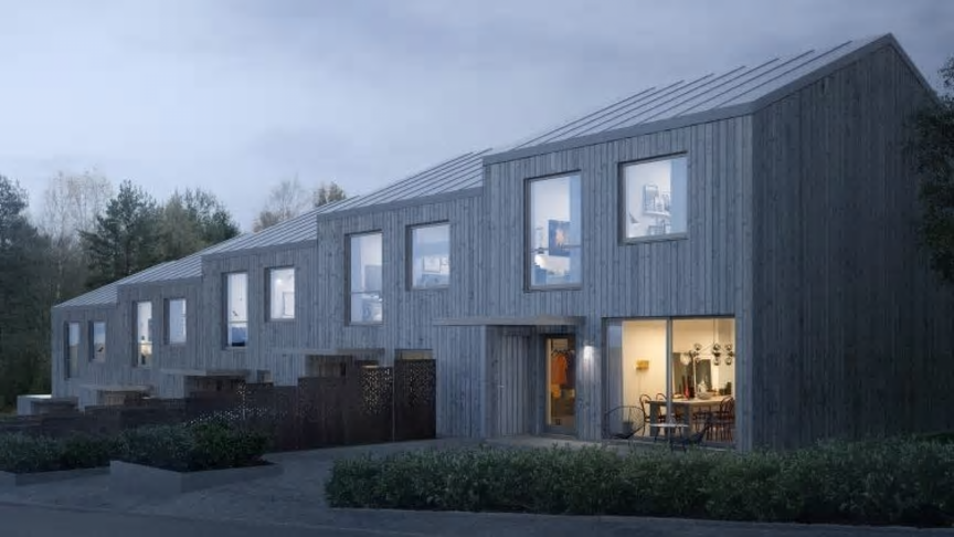 Visionsbild över de nya bostadsrättsradhus som ska byggas i området Jordgubbsfältet i Munka Ljungby.