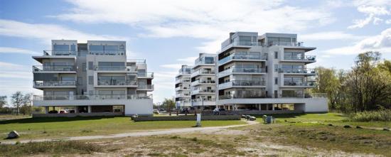 Likartade bostäder, som NCC tidigare byggt i Lomma strand åt samma kund.