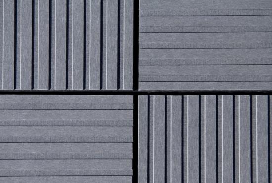 Cembrit Patina Inline - en ny fasadskiva i fibercement med linjerad yta. Mönstereffekter och spännande kontraster kan skapas genom olika montage och möten med andra naturmaterial.